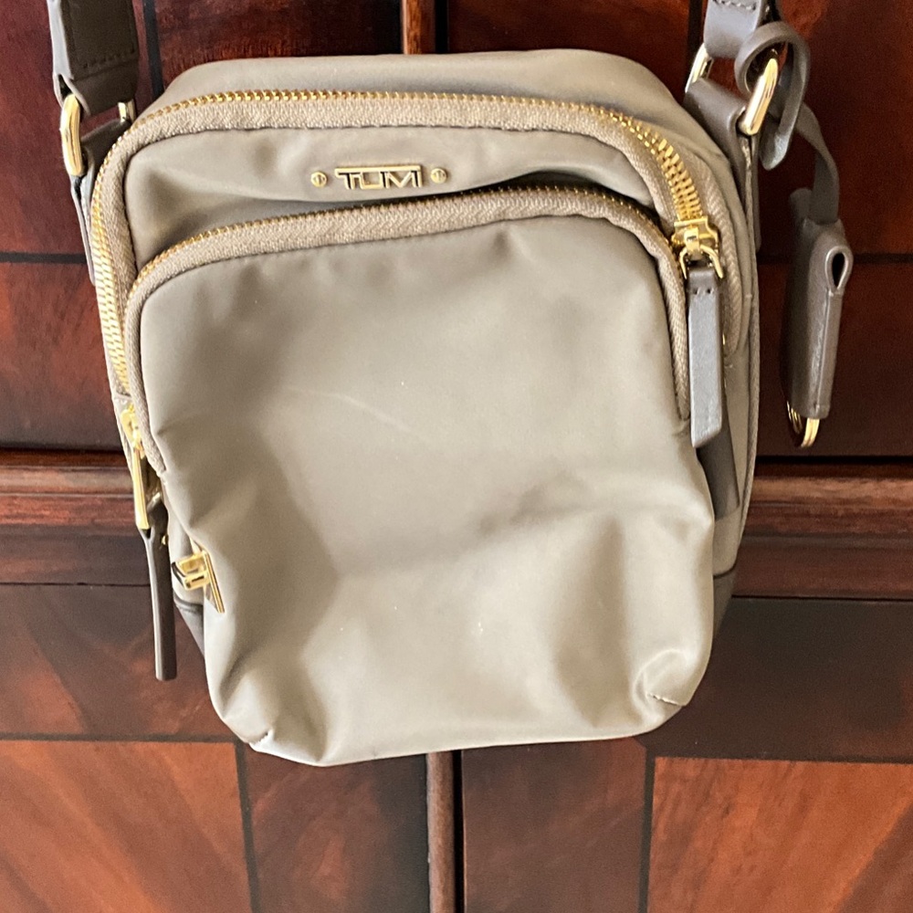 Tumi Beige Messenger Bag with Gold Accents